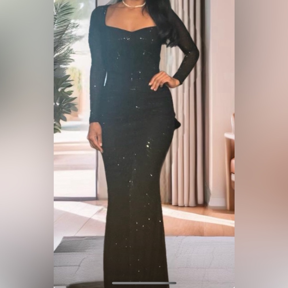 Beautiful black dress wore once. If you are size small would fit great.